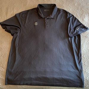 Nike Golf polo shirt with Mercedes-Benz logo stitched on breast.